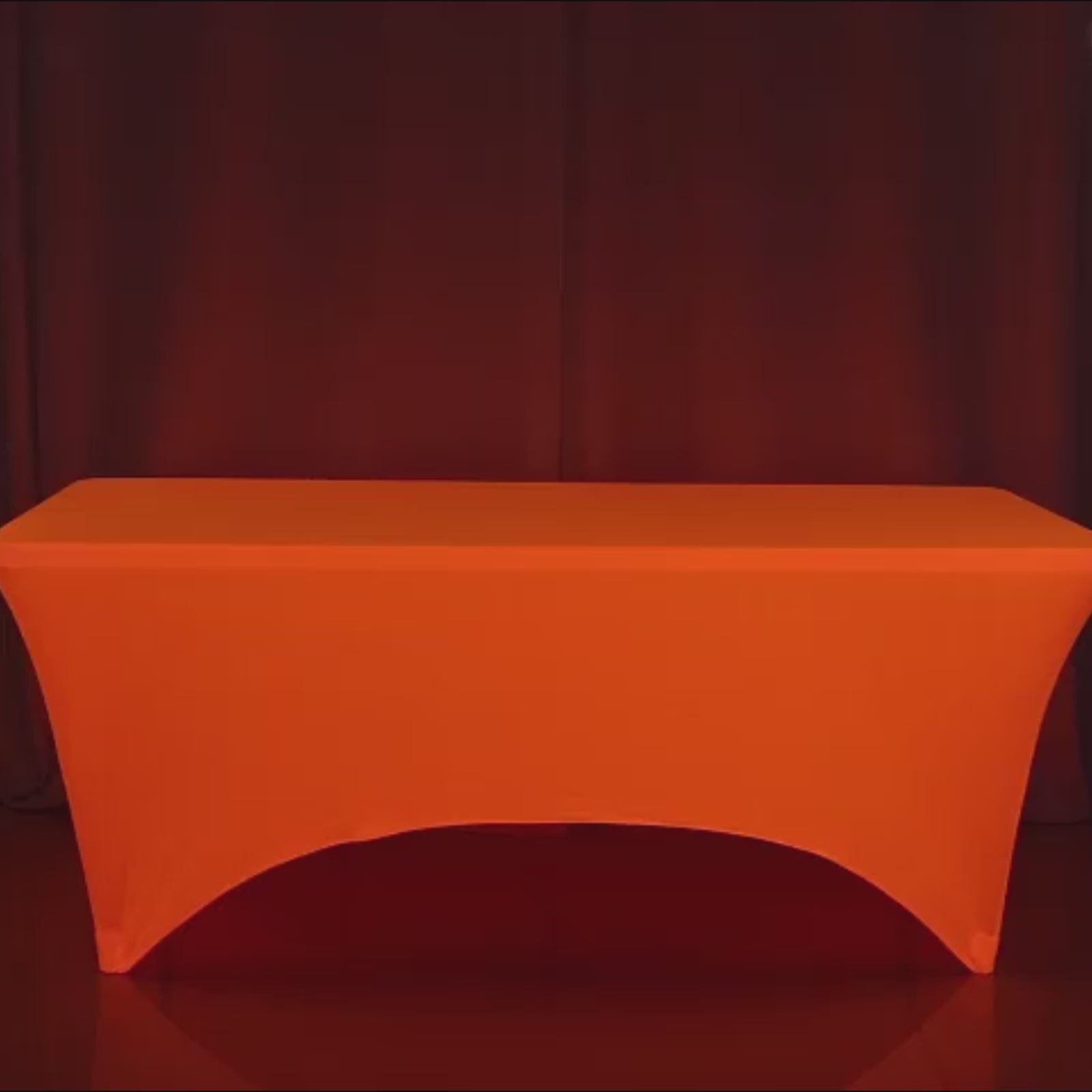 Glow Neon Orange Fitted Spandex Tablecloth on a 6ft rectangle table.