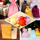 Sage green satin drawstring gift bags for weddings and parties.