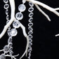 Clear acrylic crystal diamond garland chain bead roll on a decorative branch.