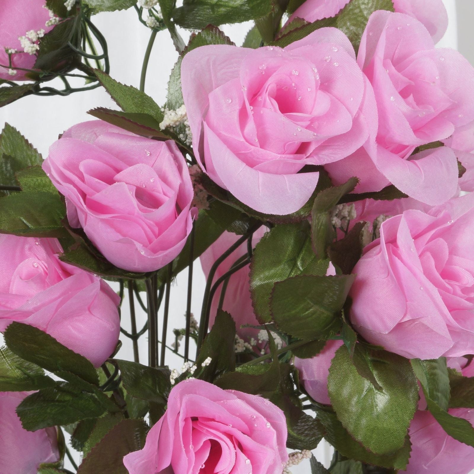 Pink artificial silk rose bud flowers bouquet. #whtbkgd