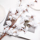 White artificial silk carnation flower stems, 42" tall, set of 2.