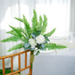 Artificial green cycas fern leaf indoor bush with faux plants.