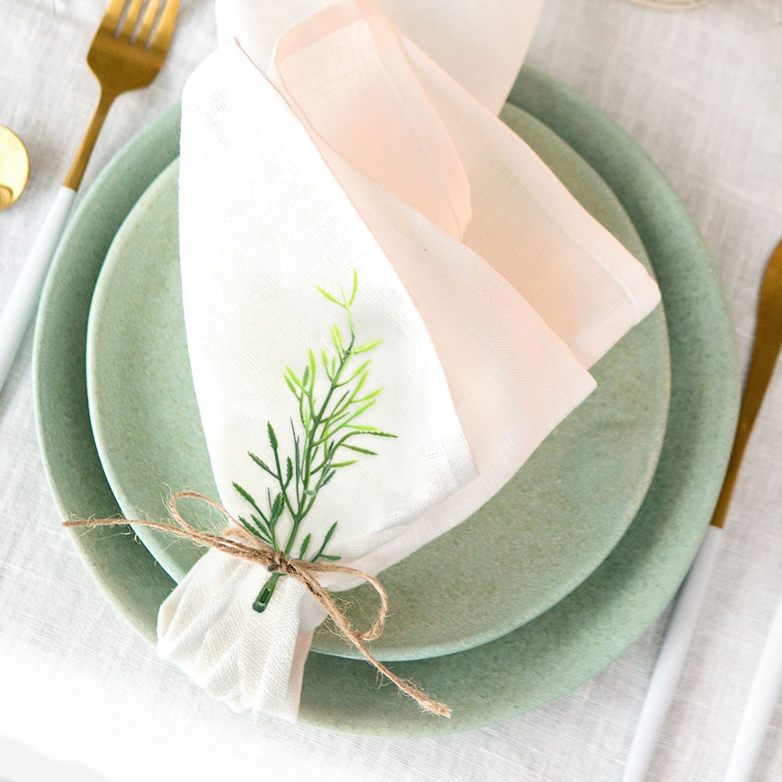 Mini green fern leaf branch stems for vase filler and centerpieces.