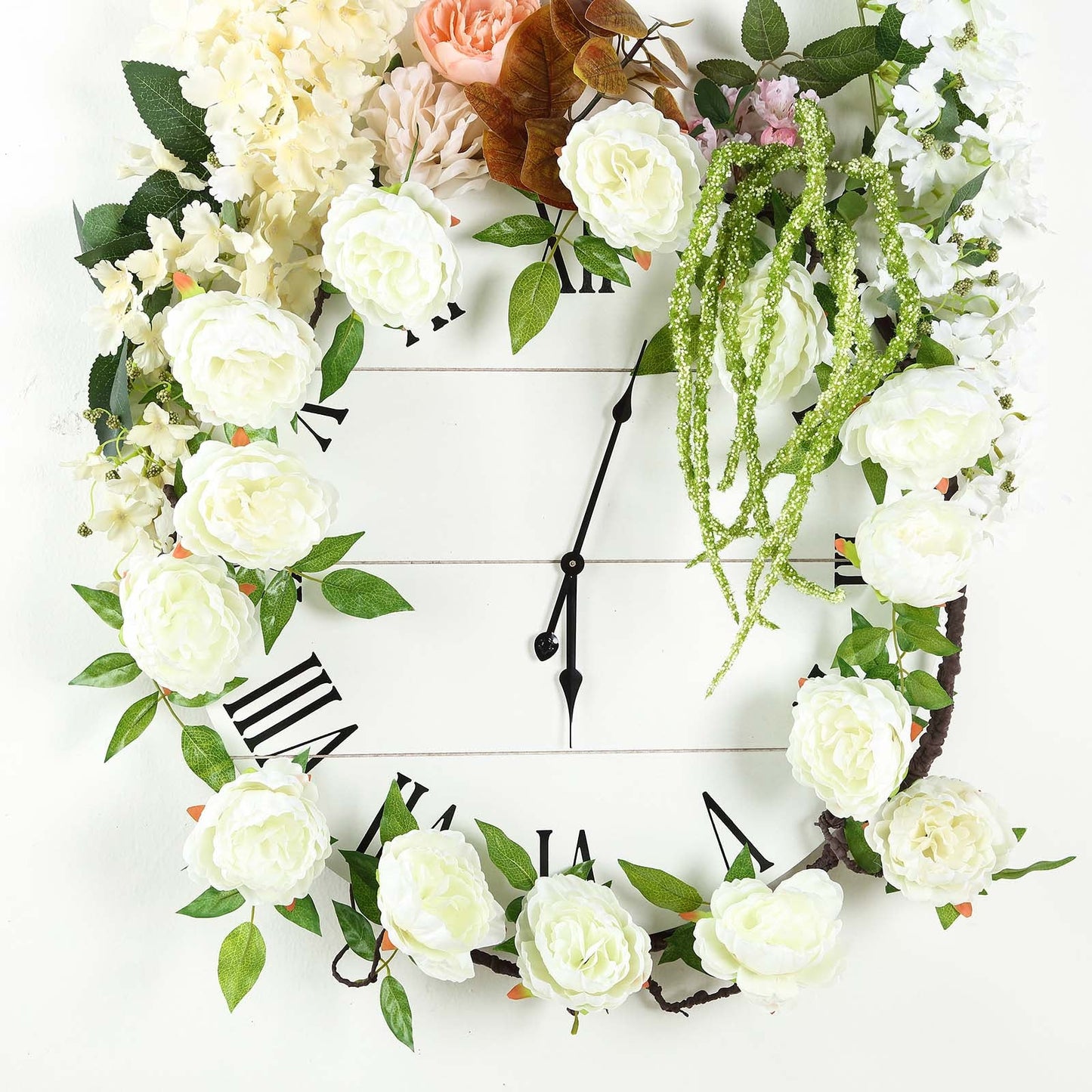 Cream artificial silk peony hanging flower garland with faux vine.