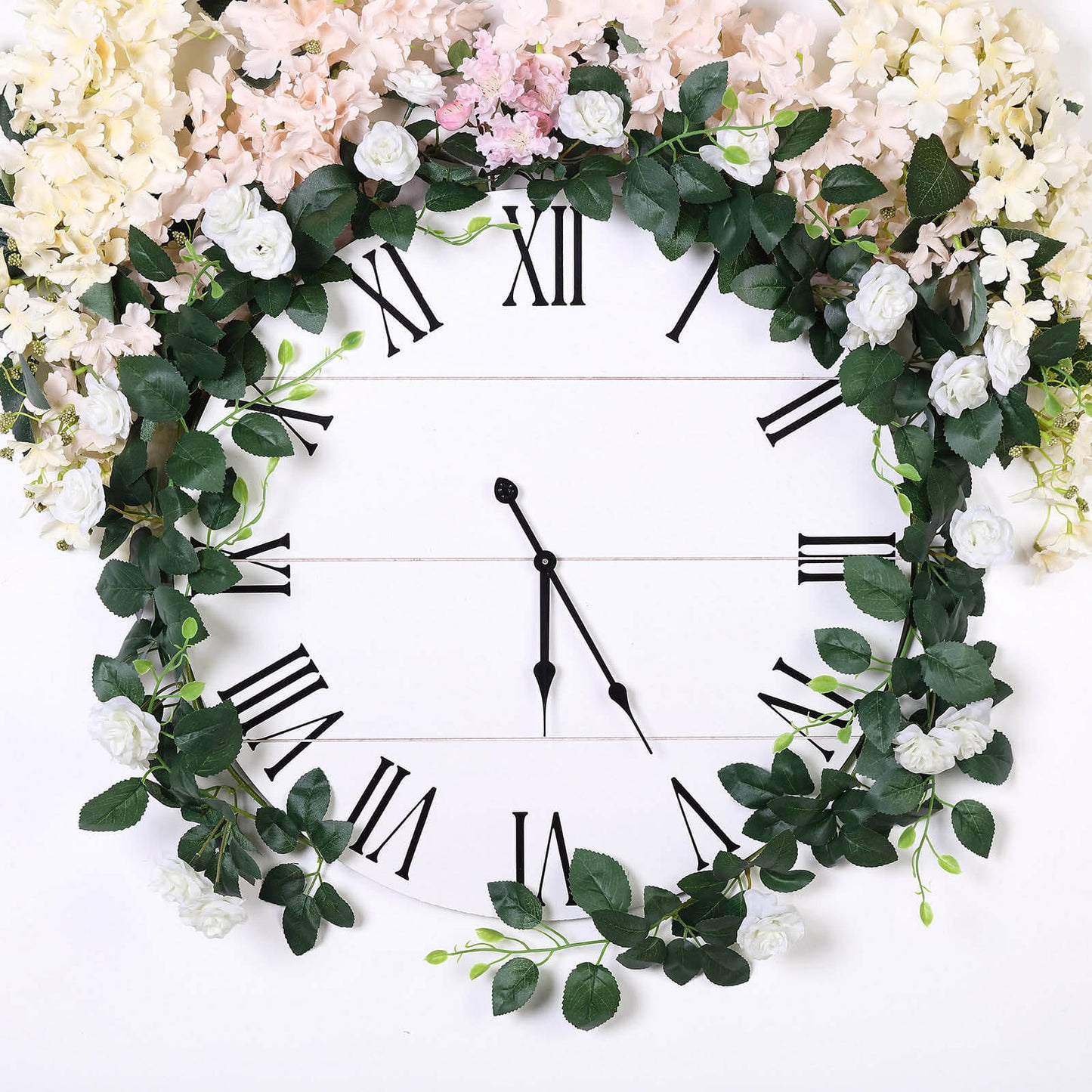 20 Cream Artificial Silk Roses Flower Garland on a clock with greenery.