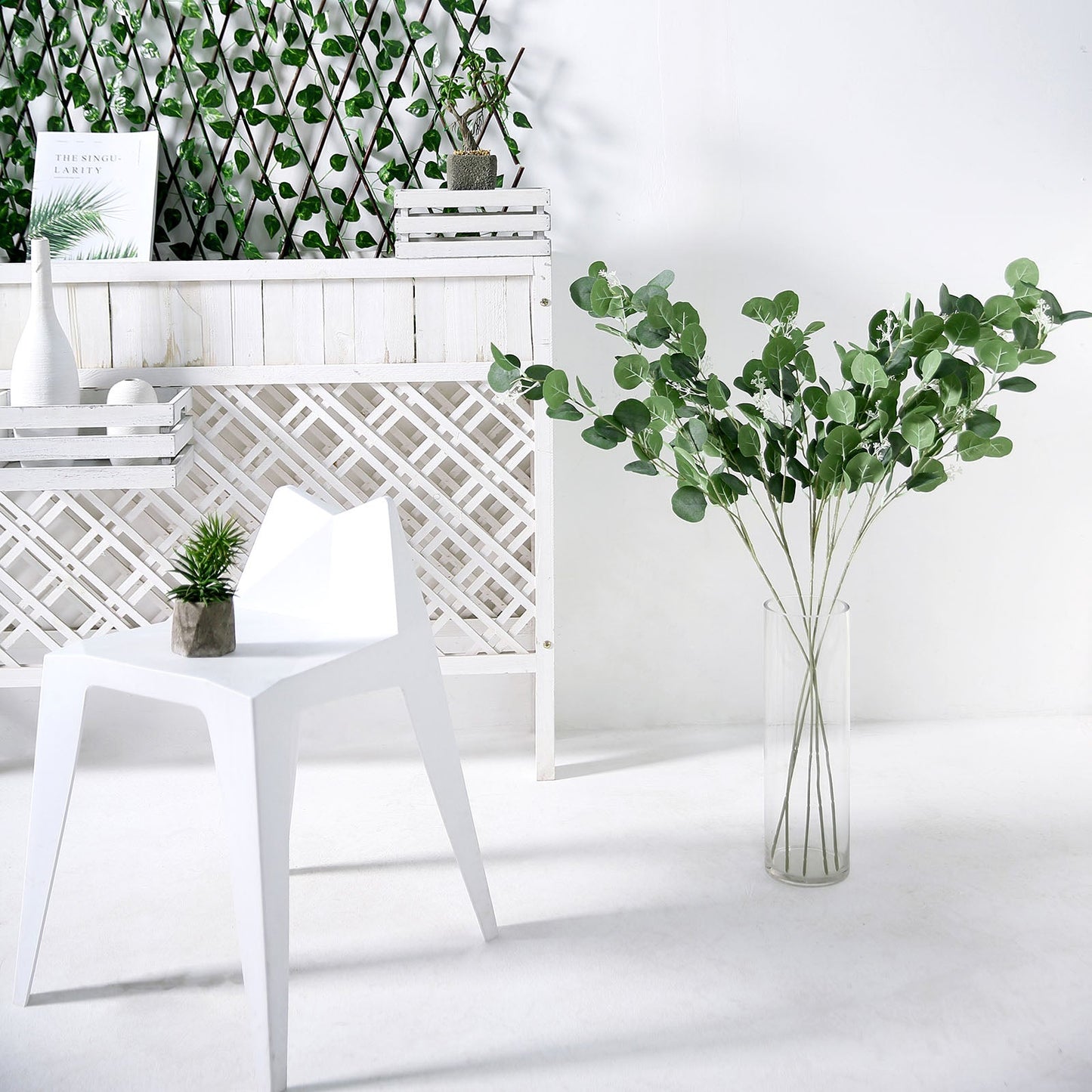 40" Tall Green Artificial Eucalyptus Branches in a clear vase.