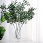 Frosted green artificial silk beech leaf branches in a vase.