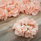 Blush artificial satin hydrangeas for DIY arrangements.