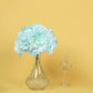 Blue artificial satin hydrangeas in a decorative vase.