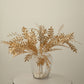 21" Metallic Gold Artificial Fern Leaf Branches in a decorative vase.