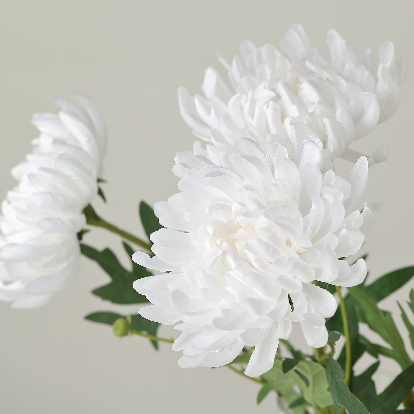 White artificial silk chrysanthemum bouquet with large faux mum branches.