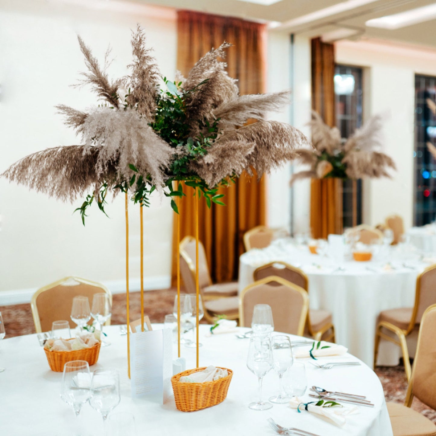 Natural tint dried pampas grass plant sprays in a decorative arrangement.