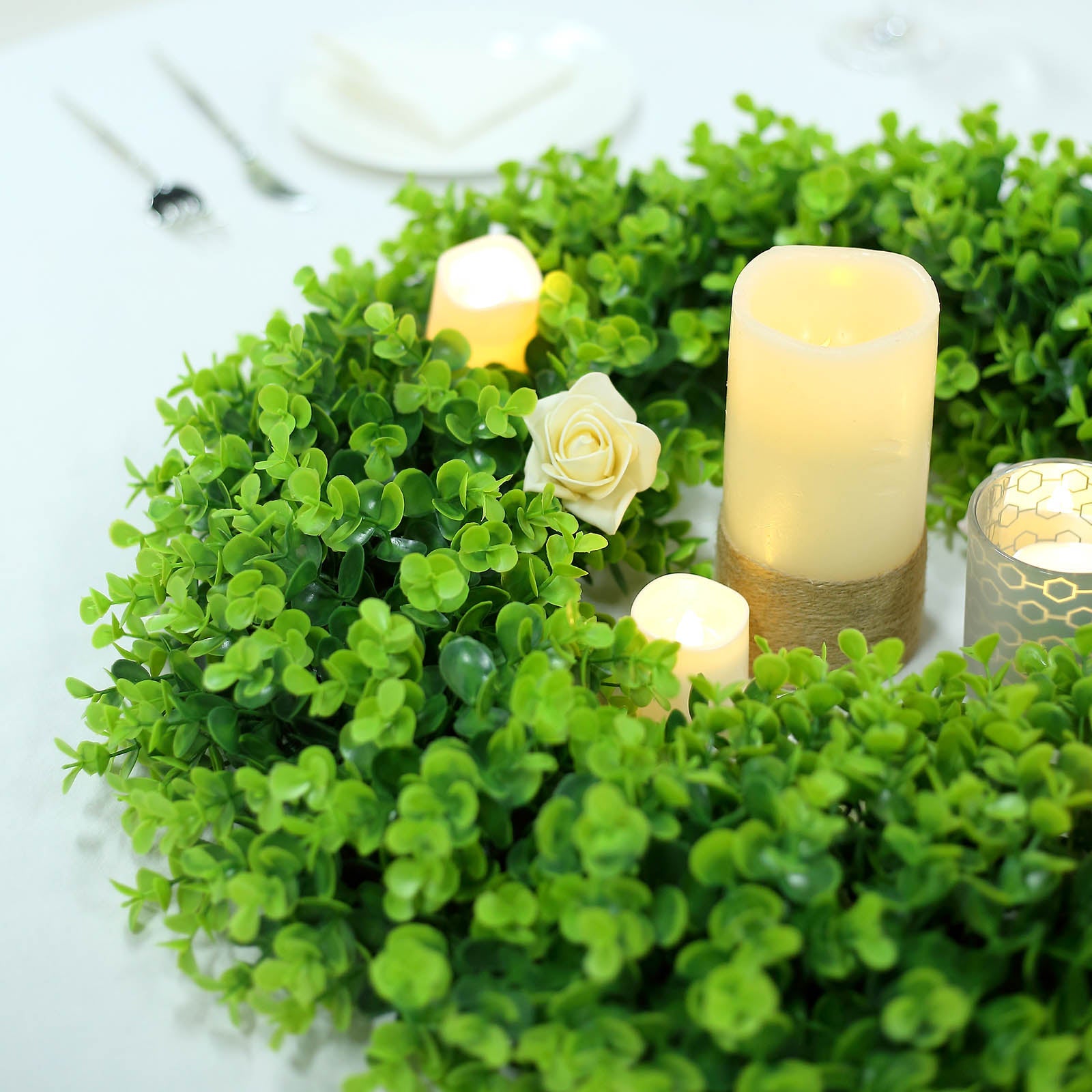 21" Green Artificial Eucalyptus Leaf Spring Wreaths with candles and decor.