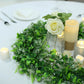 22" White/Green Artificial Boxwood Fern Mix Spring Wreaths on a table setting.