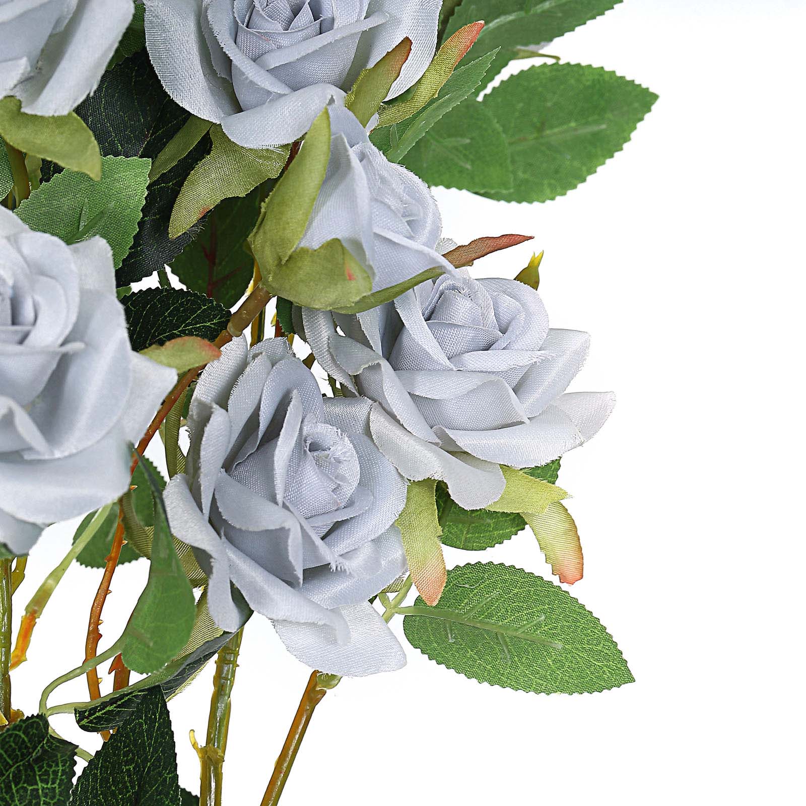 Silver artificial silk rose flower bouquet with green leaves.