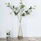Silver artificial silk rose flower bouquet in a clear vase.