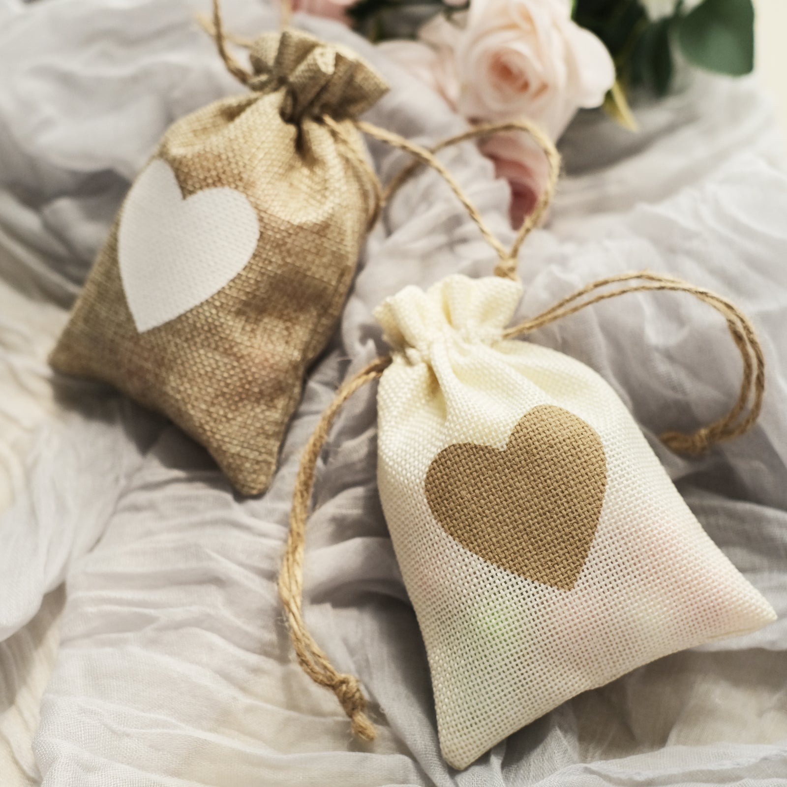Natural heart design gift bags with drawstring, rustic style.