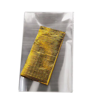 Clear gift bags with gold twist ties for treats or candies.