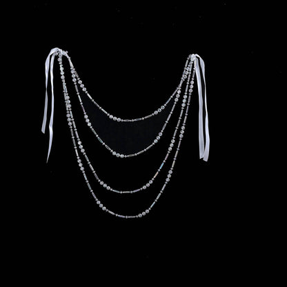 Iridescent faux pearl beaded chair back garland with ribbons.