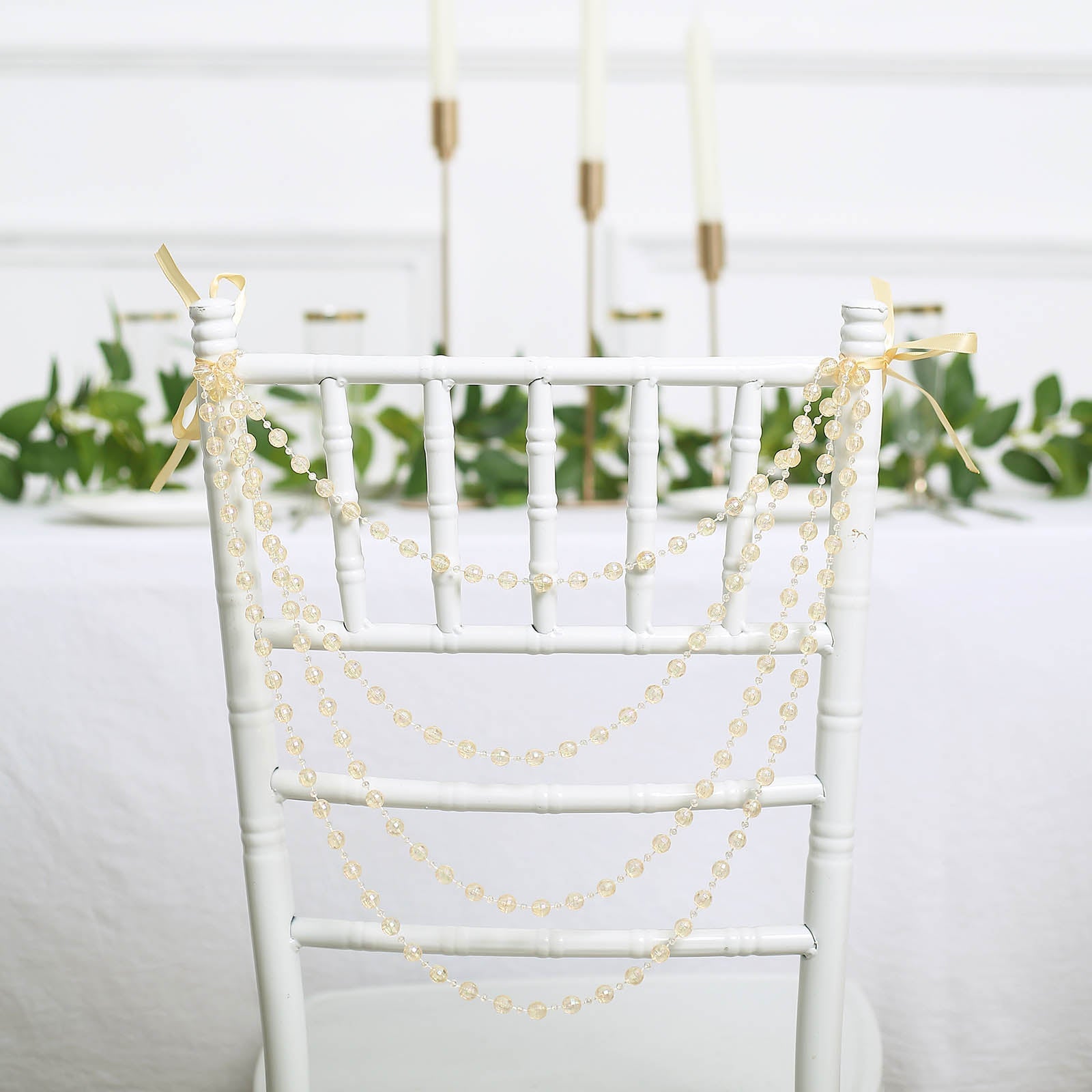 Amber beaded garland chair decor for weddings