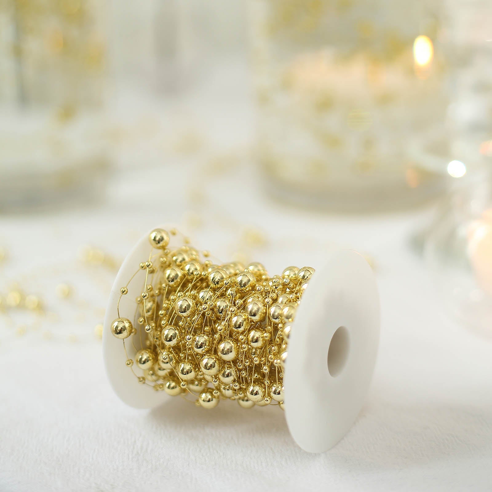 Gold pearl vase filler for floating candles and table centerpiece decor.