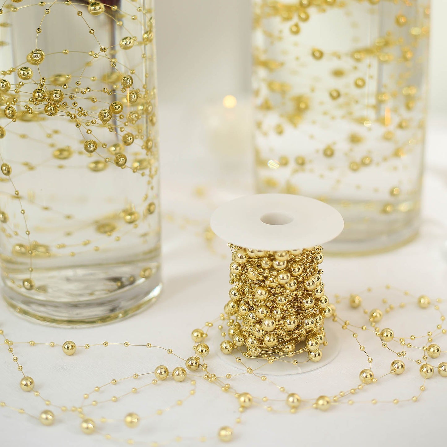 Gold pearl vase filler for floating candles and table centerpiece decor.
