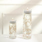 Rose gold vase filler for floating candles in elegant table centerpiece.
