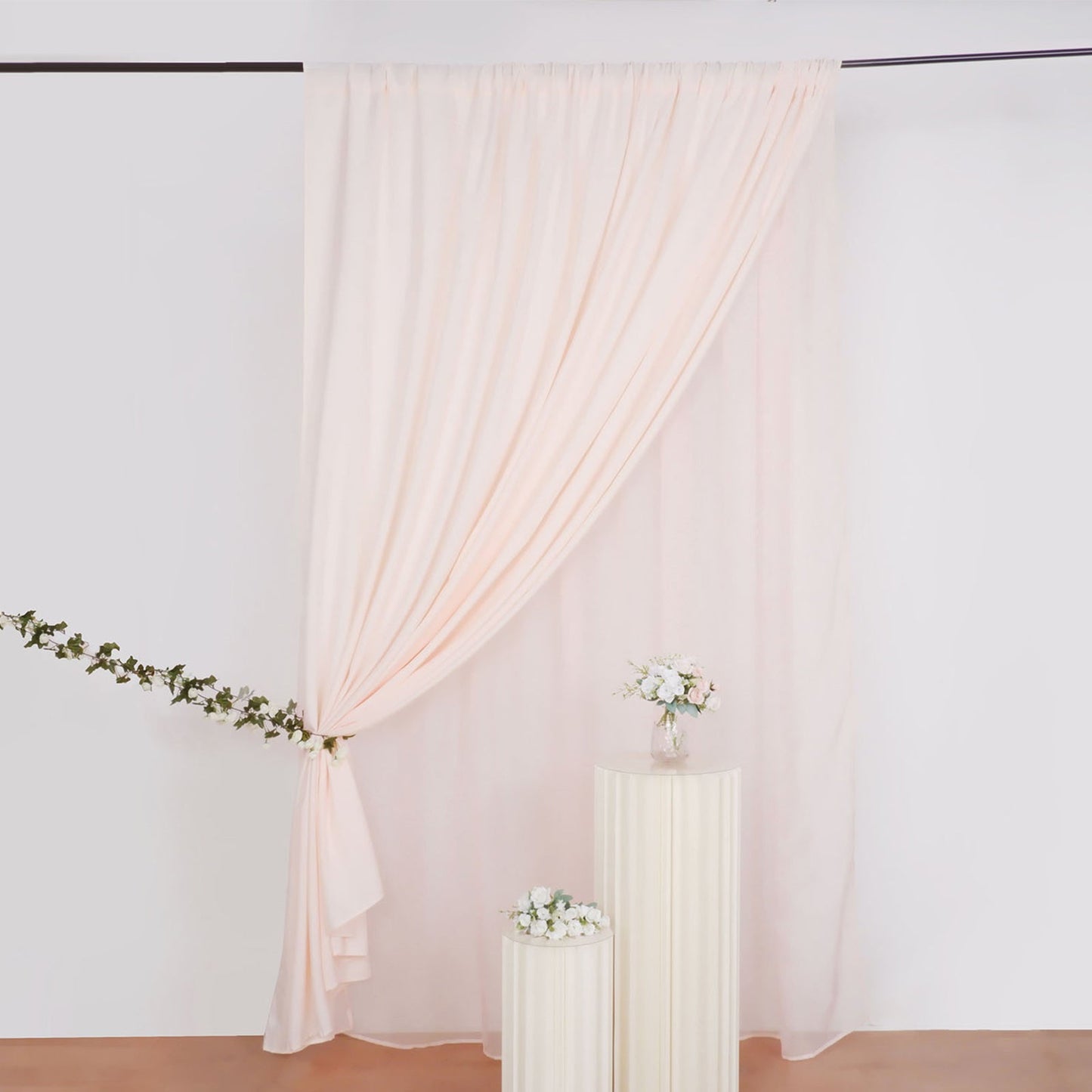 Blush chiffon polyester event curtain drapes in a soft pink color.