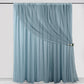 Dusty blue chiffon curtain drapes with dual layers and rod pockets.