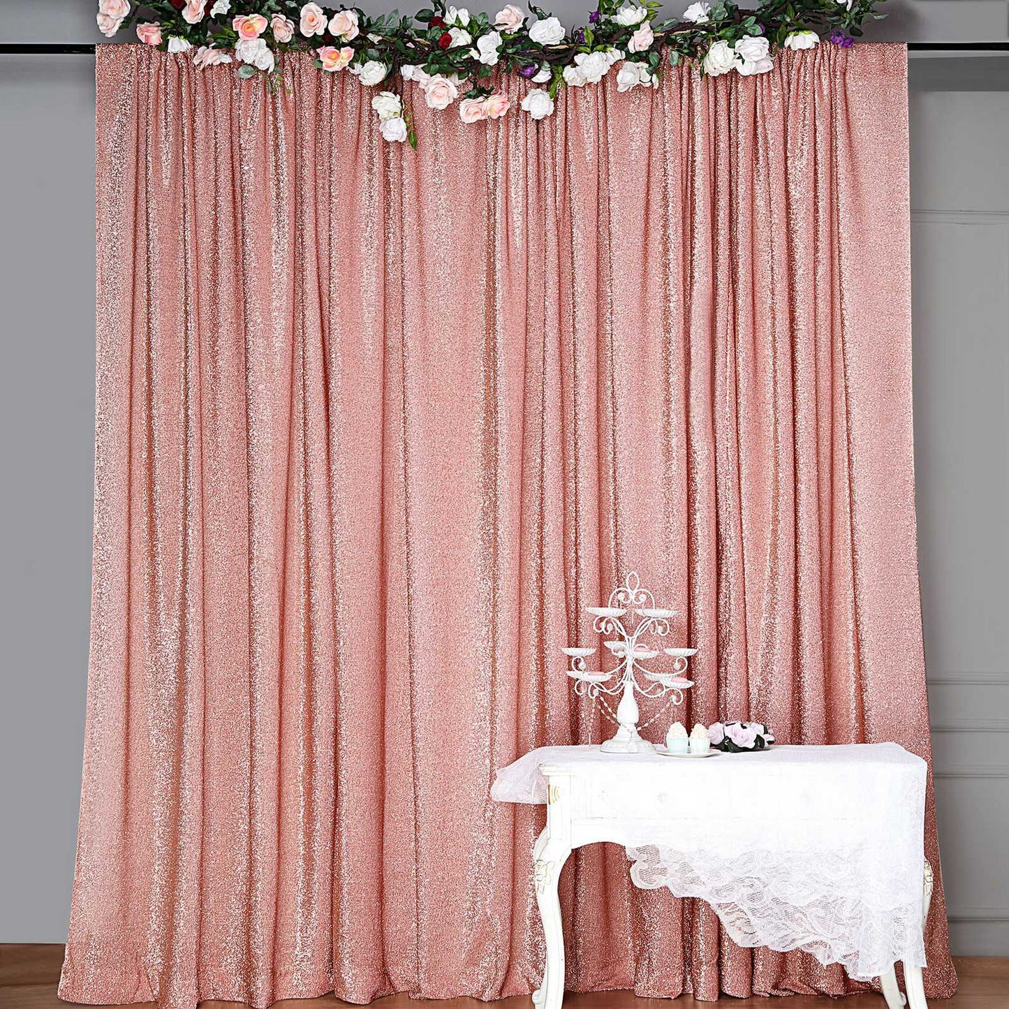 Rose gold metallic shimmer tinsel event curtain drapes backdrop.