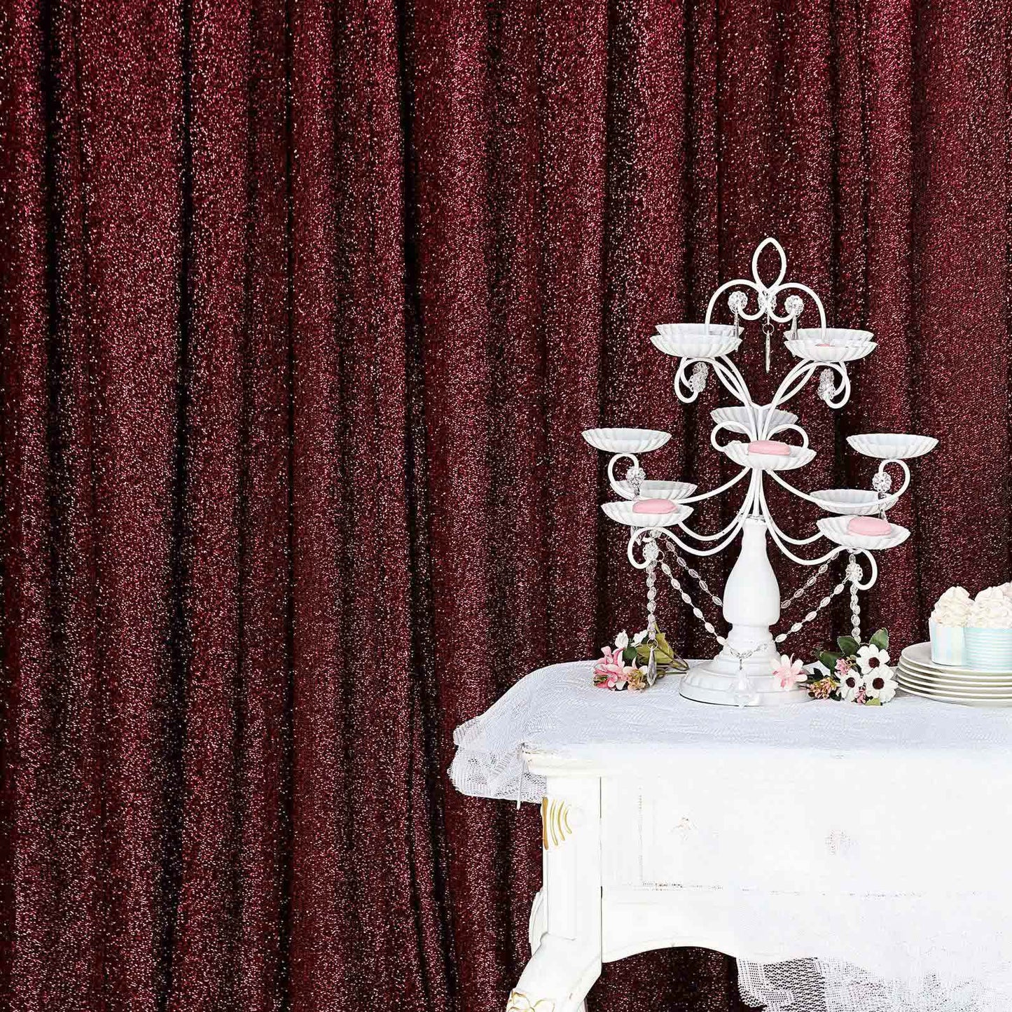 Burgundy metallic shimmer tinsel backdrop curtain drapes for events.