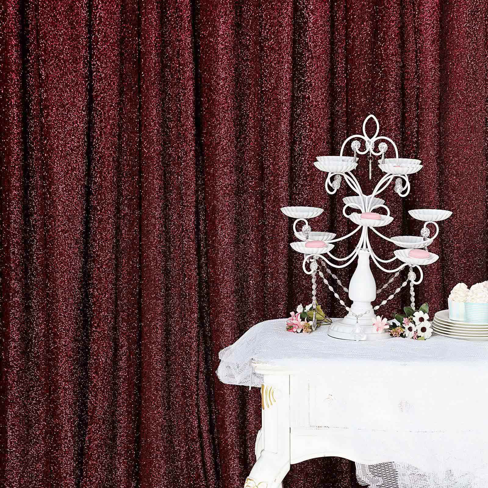 Burgundy metallic shimmer tinsel backdrop curtain drapes for events.