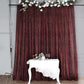 Burgundy metallic shimmer tinsel backdrop event curtain drapes.