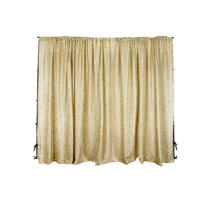 Champagne metallic shimmer tinsel backdrop curtain drapes for events.
