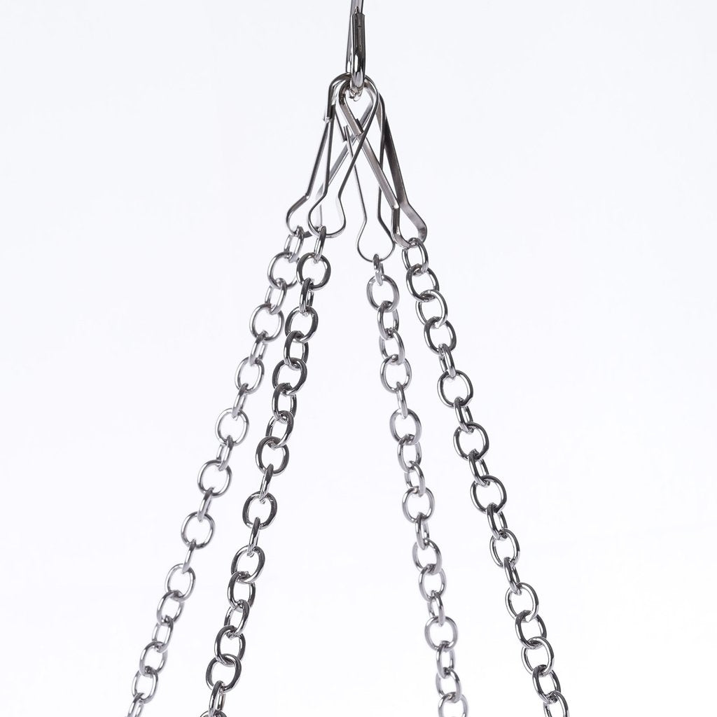 Stainless steel hanging hoop hardware for white ceiling drape installation.
