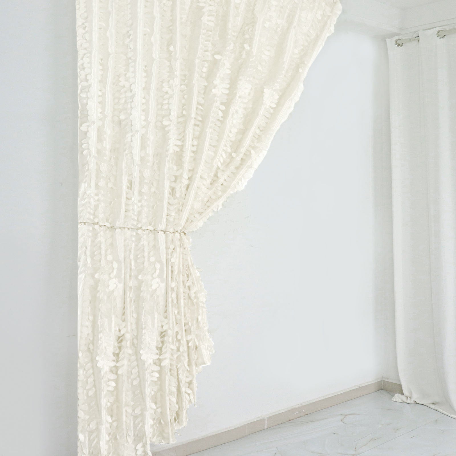 Ivory 3D leaf petal taffeta event curtain drapes in a stylish setting.