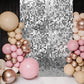 Ritzy silver sequin backdrop panels for party décor.