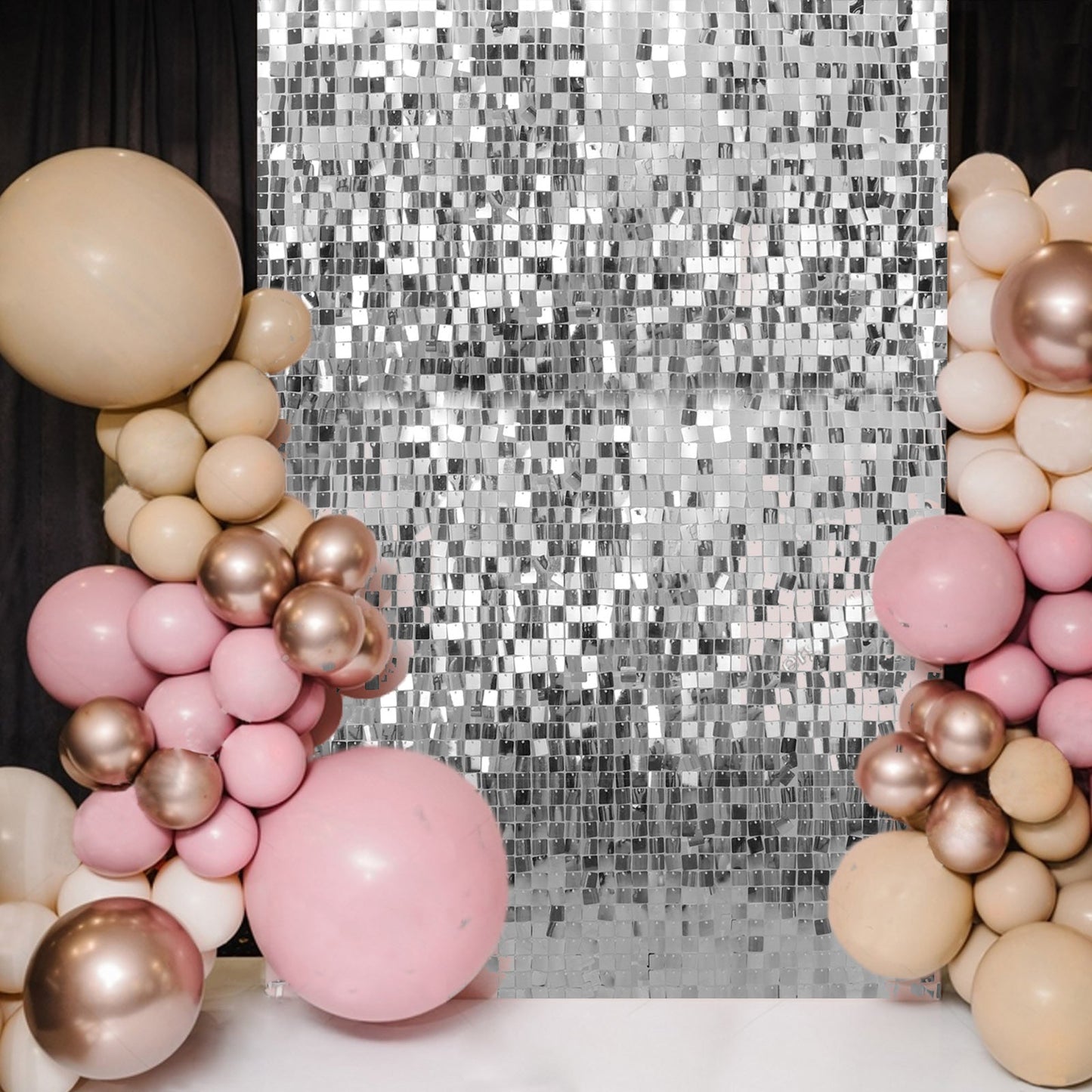 Ritzy silver sequin backdrop panels for party décor.