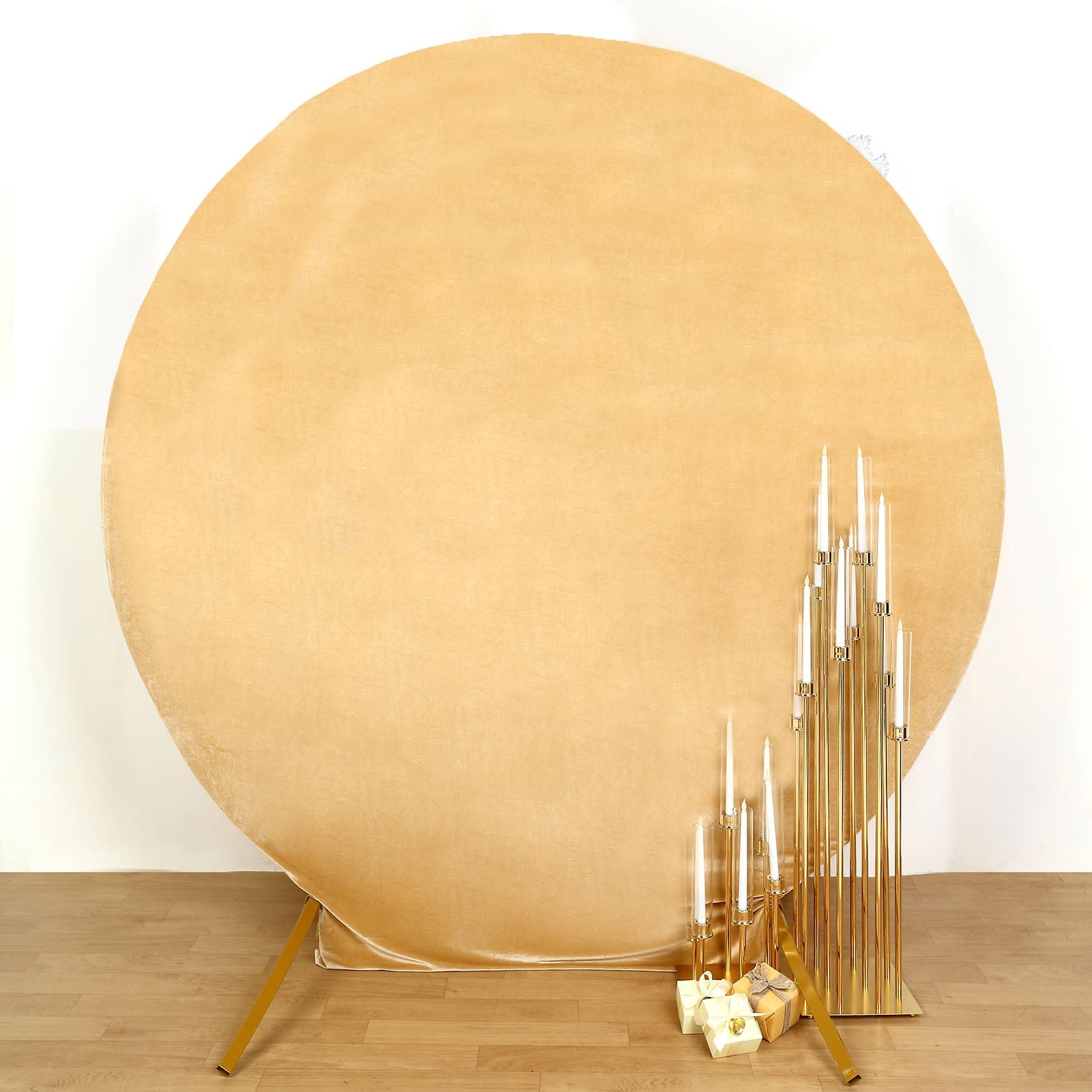 Champagne velvet round wedding arch cover for elegant ceremonies.