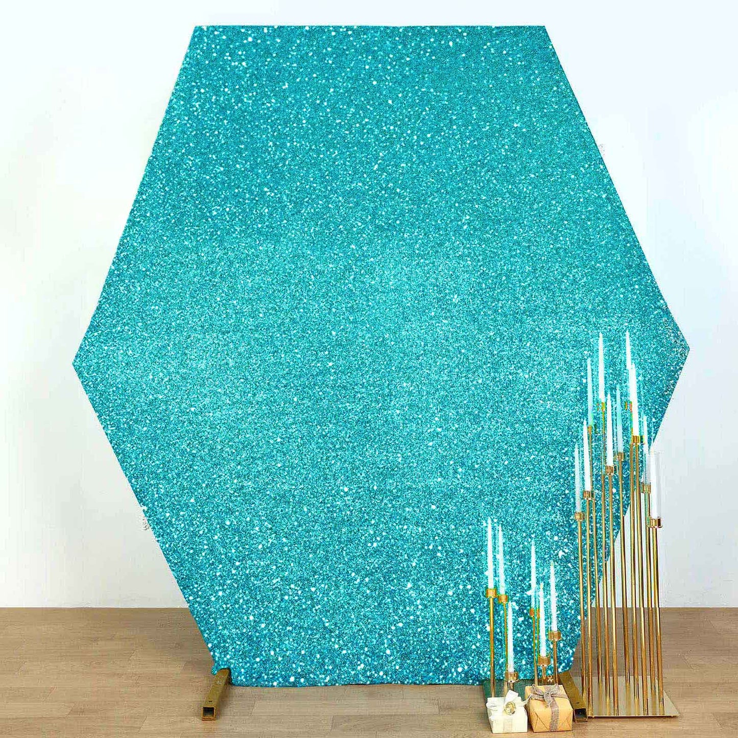 Turquoise metallic shimmer tinsel hexagon backdrop for weddings.