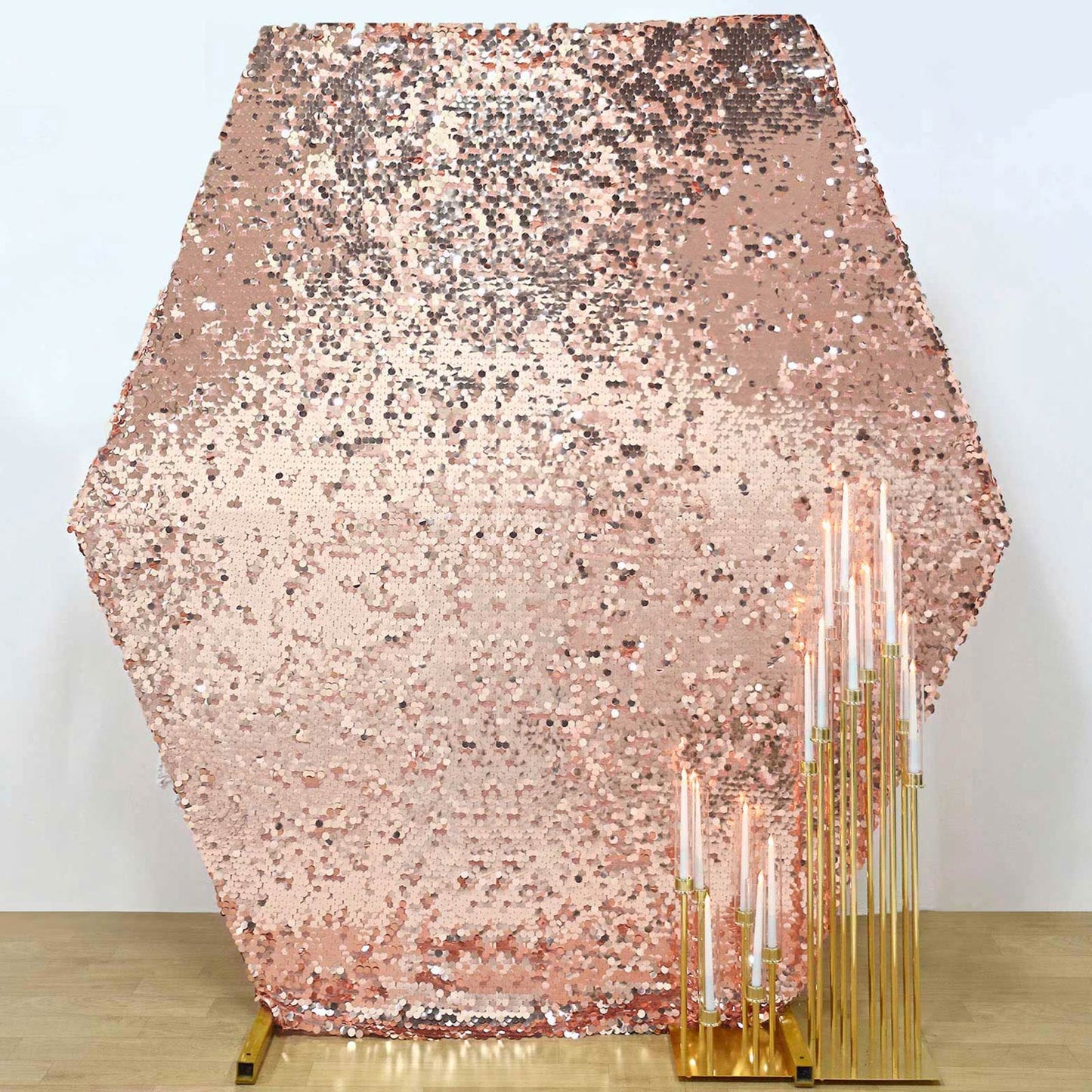 Rose gold sequin hexagon wedding arch cover.