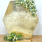 Champagne sequin hexagon wedding arch cover with floral accents.