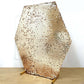 Gold sequin hexagon wedding arch cover for sparkling decor.