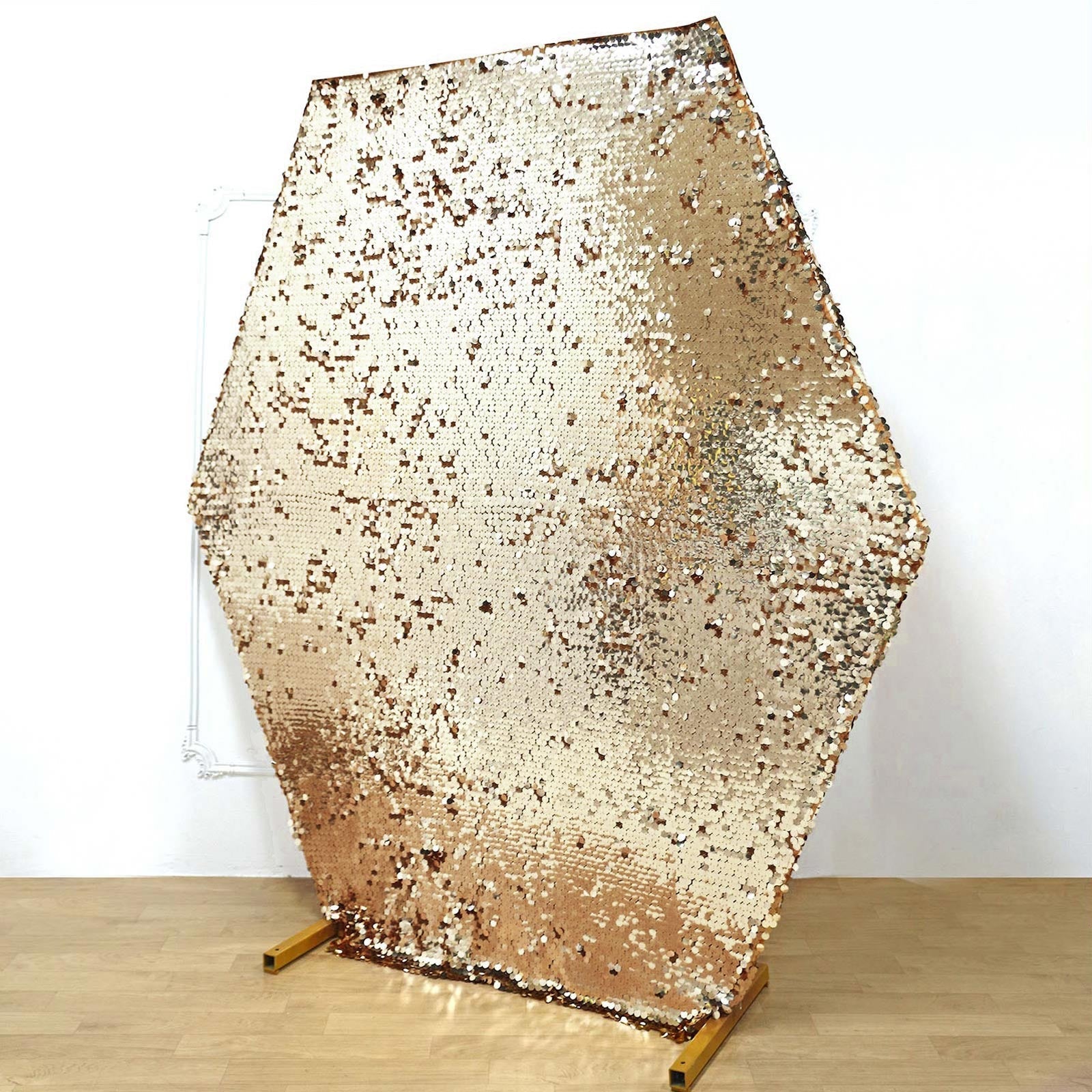 Gold sequin hexagon wedding arch cover for sparkling decor.