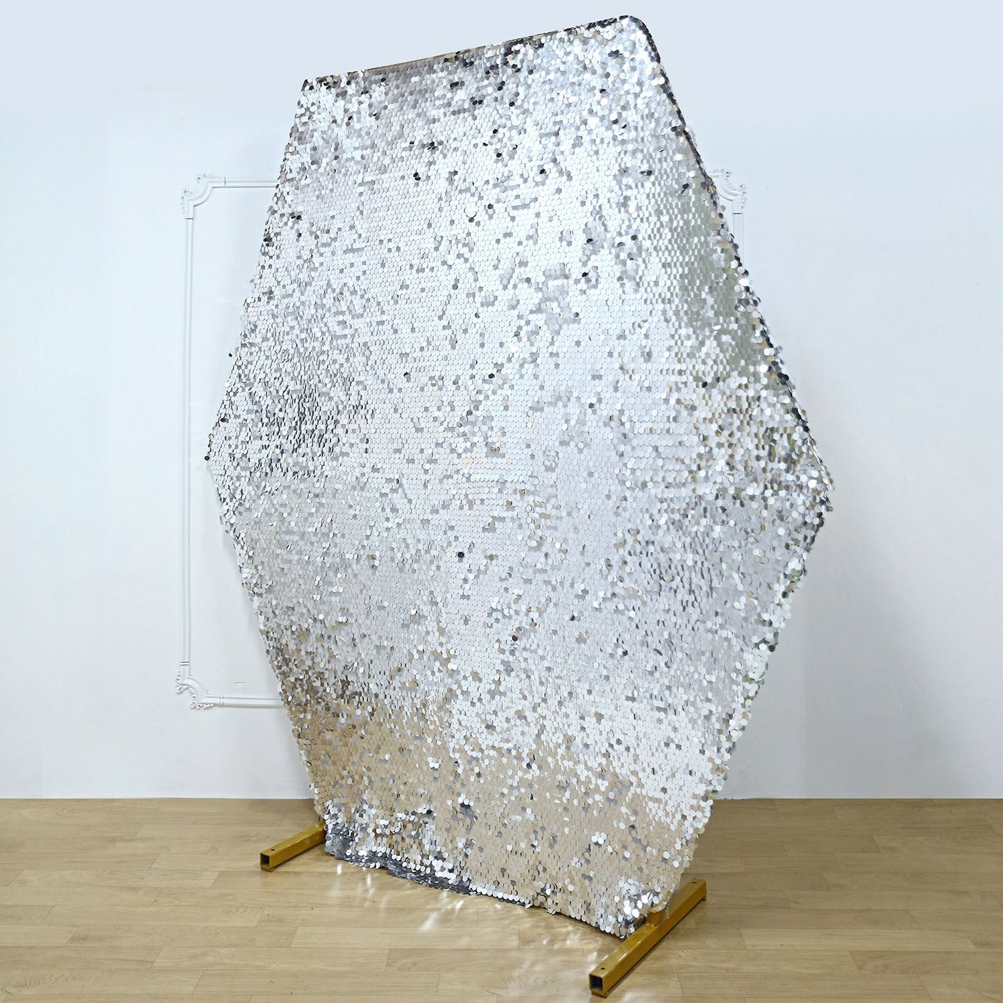 Silver sequin hexagon wedding arch cover for event decor.