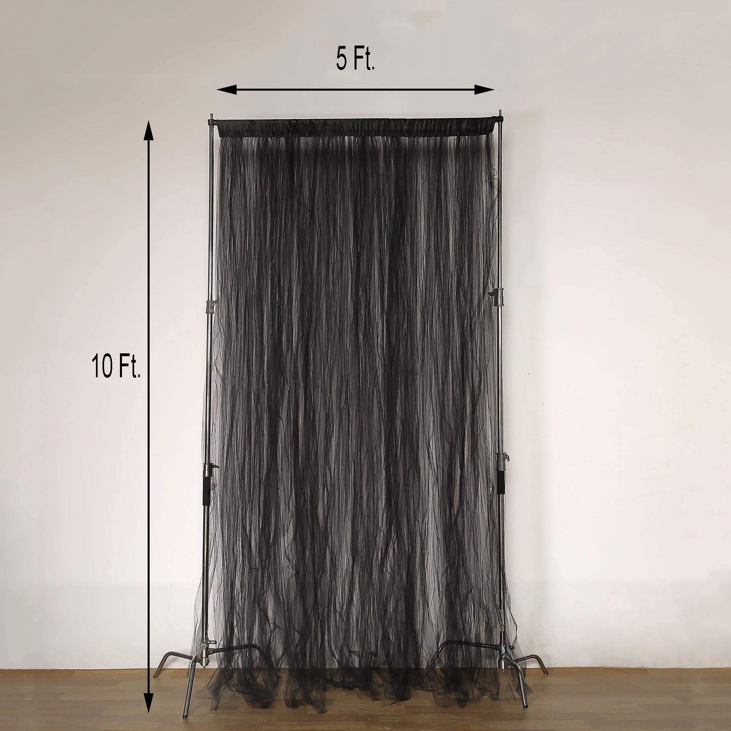 Black sheer tulle event curtain drapes with satin header, rod ready backdrop.