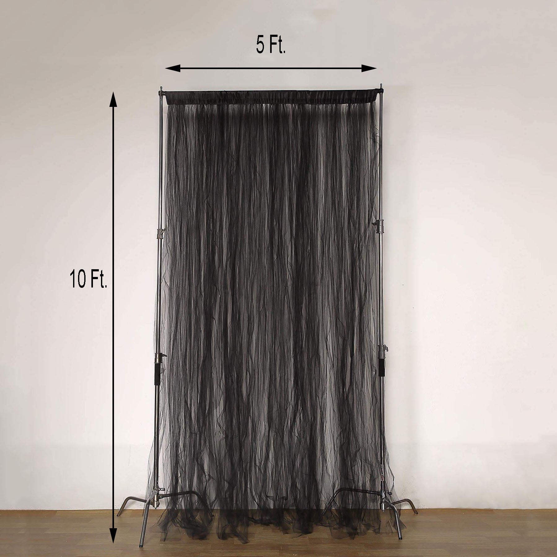 Black sheer tulle event curtain drapes with satin header, rod ready backdrop.
