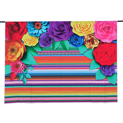 Colorful Cinco De Mayo fiesta backdrop with multi-color stripes and paper flowers.