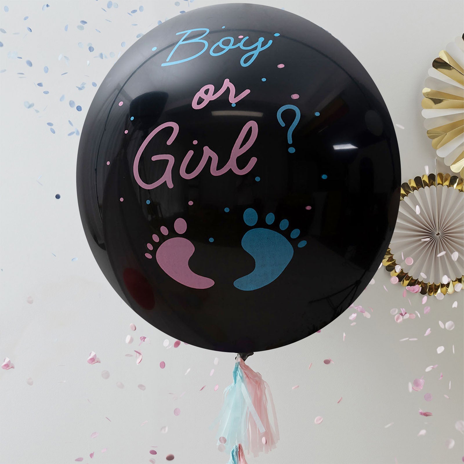 Black balloon with blue and pink confetti for gender reveal.