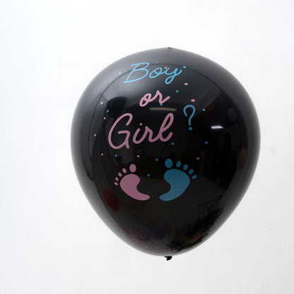 Black balloon with blue and pink confetti for gender reveal.